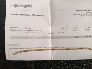 Pulsera de oro 18 kilates con piedras moradas
