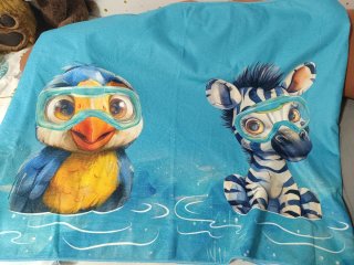 Toalla infantil piscina cebra y pato