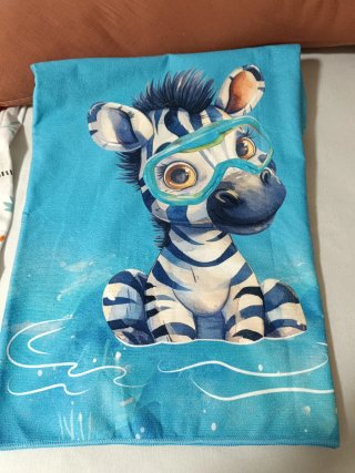 Toalla infantil piscina cebra y pato