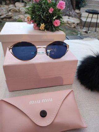 Gafas de sol Miu Miu doradas y azules