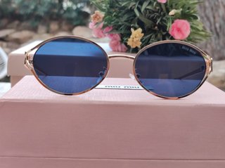 Gafas de sol Miu Miu doradas y azules