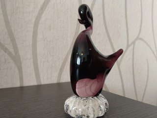 Figura de cristal soplando