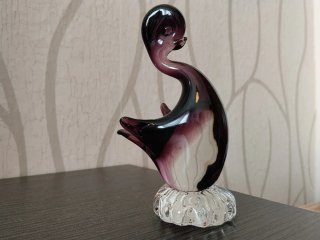 Figura de cristal soplando