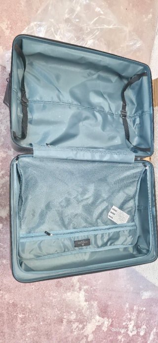 Maleta de viaje gris