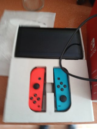 Nintendo Switch OLED Azul y Naranja