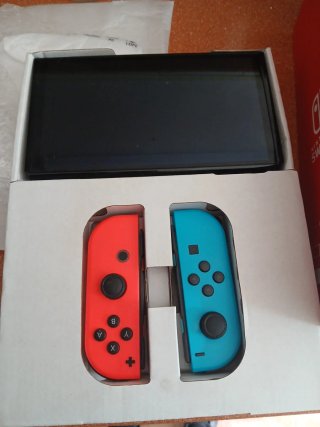 Nintendo Switch OLED Azul y Naranja