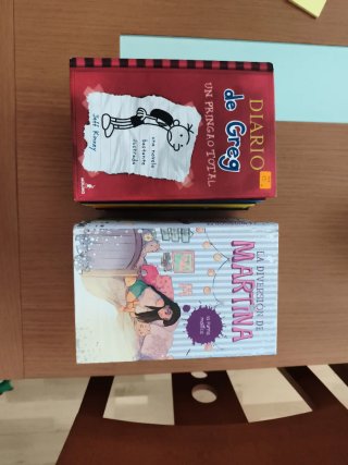 Libros Diario de Greg y La diversión de Martina