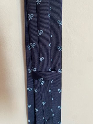 Corbata azul con raquetas silbon