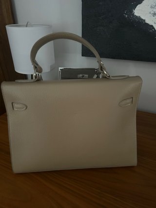Bolso de mano piel topo Tiene asa y bandolera