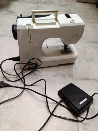 Máquina de coser Lazer