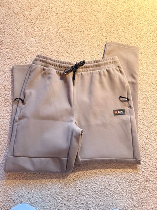 Pantalón jogger deportivo con bolsillos/cremallera