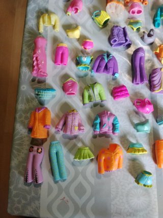 Lote 9 Muñecas Polly Pocket con Vestidos