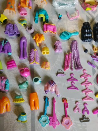 Lote 9 Muñecas Polly Pocket con Vestidos