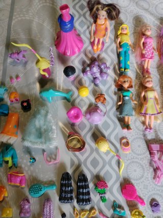 Lote 9 Muñecas Polly Pocket con Vestidos