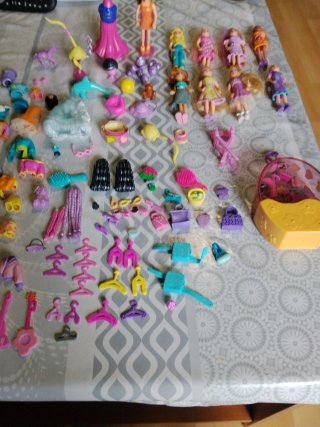 Lote 9 Muñecas Polly Pocket con Vestidos