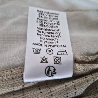 Pantalones clásicos beige