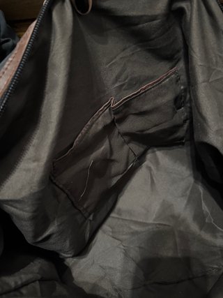 Bolsa de viaje negra y marrón