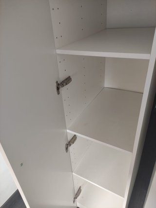 Armarios altos blancos de madera