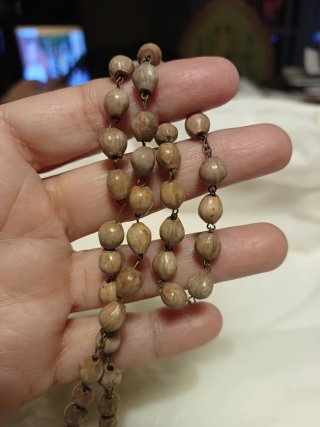 Rosario de madera con cruz