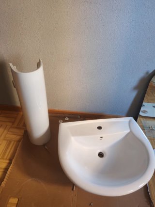 Lavabo con pie de porcelana blanco