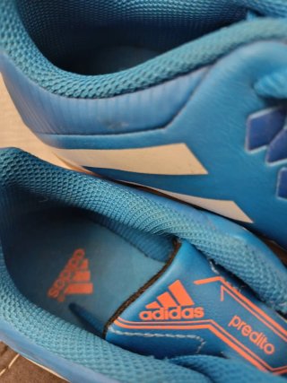 Botas de fútbol Adidas niño azul y naranja