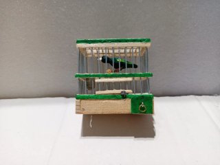 Jaula artesanal en miniatura