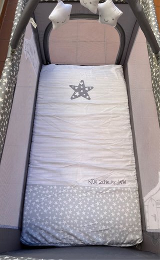 Cuna de viaje Jané con estrellas