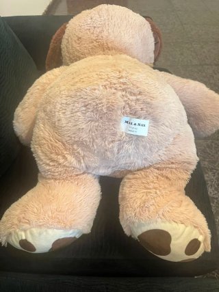 Oso de peluche grande con corbata
