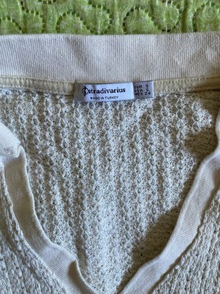 Camiseta punto Stradivarius beige sin mangas