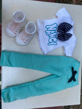 Nancy con todos sus outfits