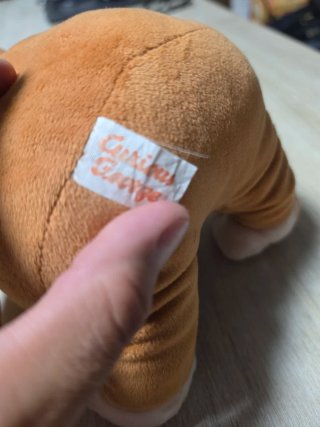 Peluche scimmietta curiosa George foulard azzurro