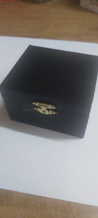 Batería miniatura dorada