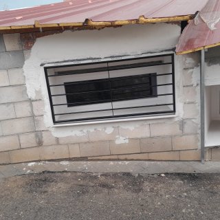 Protectores de ventana metálicos
