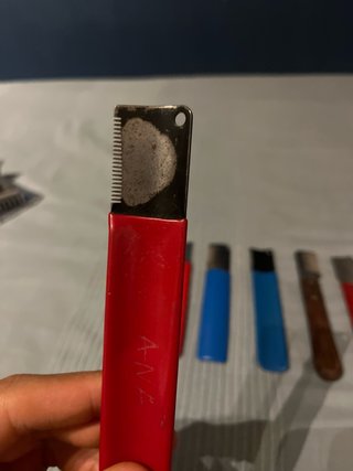 Herramienta de corte y peinado para perros y gatos