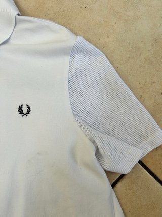Polo fred perry bianco con pieghe