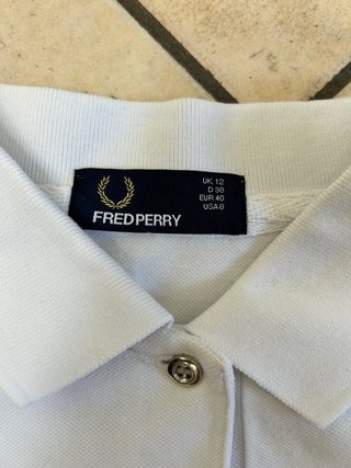 Polo fred perry bianco con pieghe