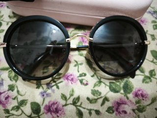 Gafas de sol Tous negras y doradas