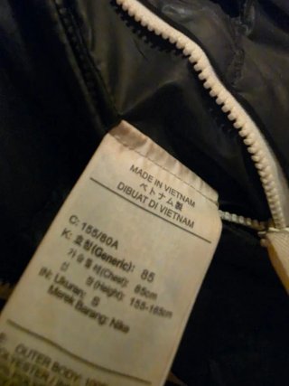 Chaqueta larga Nike reversible Talla S