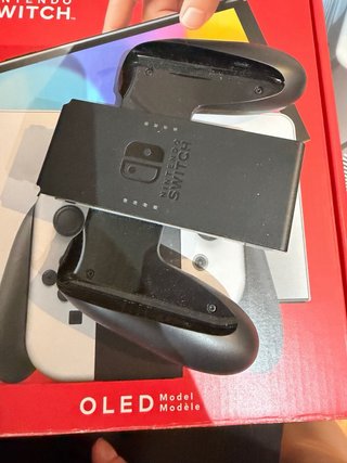 Nintendo Switch OLED Blanca y Negra + 2 juegos