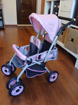 Carrito de juguete gemelar rosa