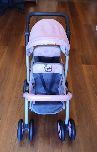 Carrito de juguete gemelar rosa