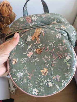 Mochila verde estampado floral
