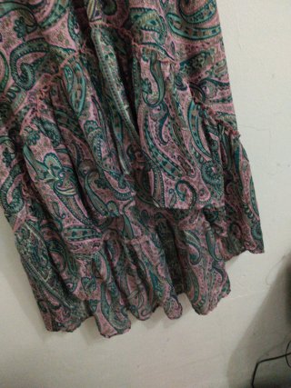 Falda larga estampada corta delante larga detras