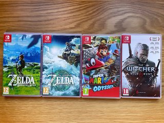 Nintendo Switch Lite + 4 Juegos