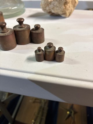 Juego de pesas de bronce