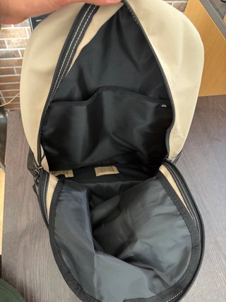 Zaino Quiksilver beige e nero, mai utilizzato