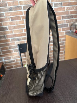 Zaino Quiksilver beige e nero, mai utilizzato