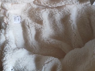 Buzo de invierno para bebé con capucha Zara