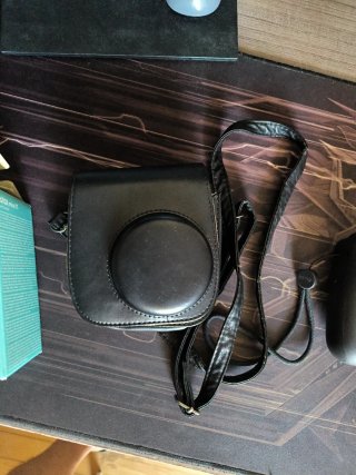 Cámara Fujifilm Instax Mini 11 + Funda Negra