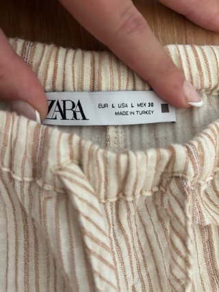 Pantalones de lino beige rayas